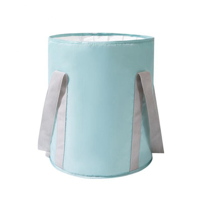 Bain de Pied Portable en turquoise avec poignées grises et ouverture en haut, effet coussin rond.